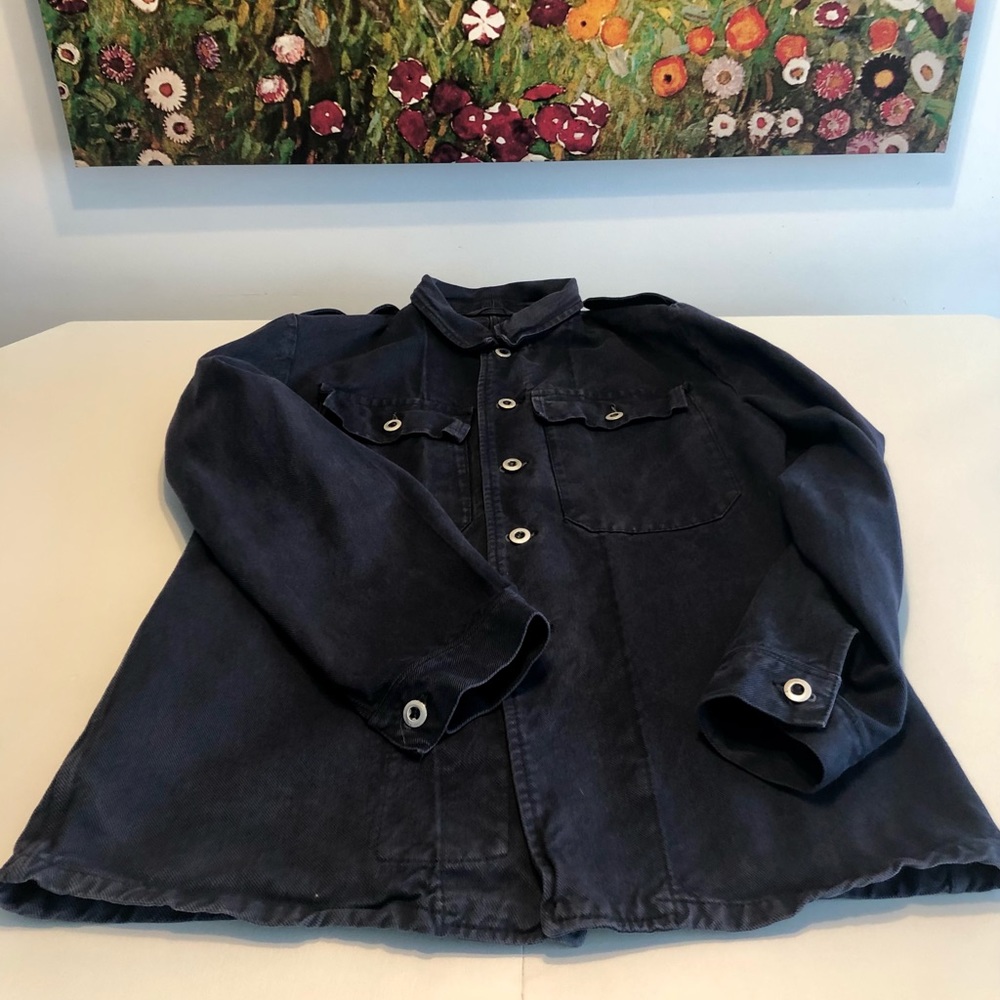 Navy blue canevas chore jacket.